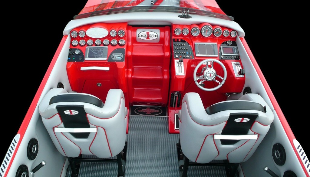 Performance is one admirable aspect of Cigarette as is the meticulous fitout and finish as seen at the helm of this Top Gun.  © SW